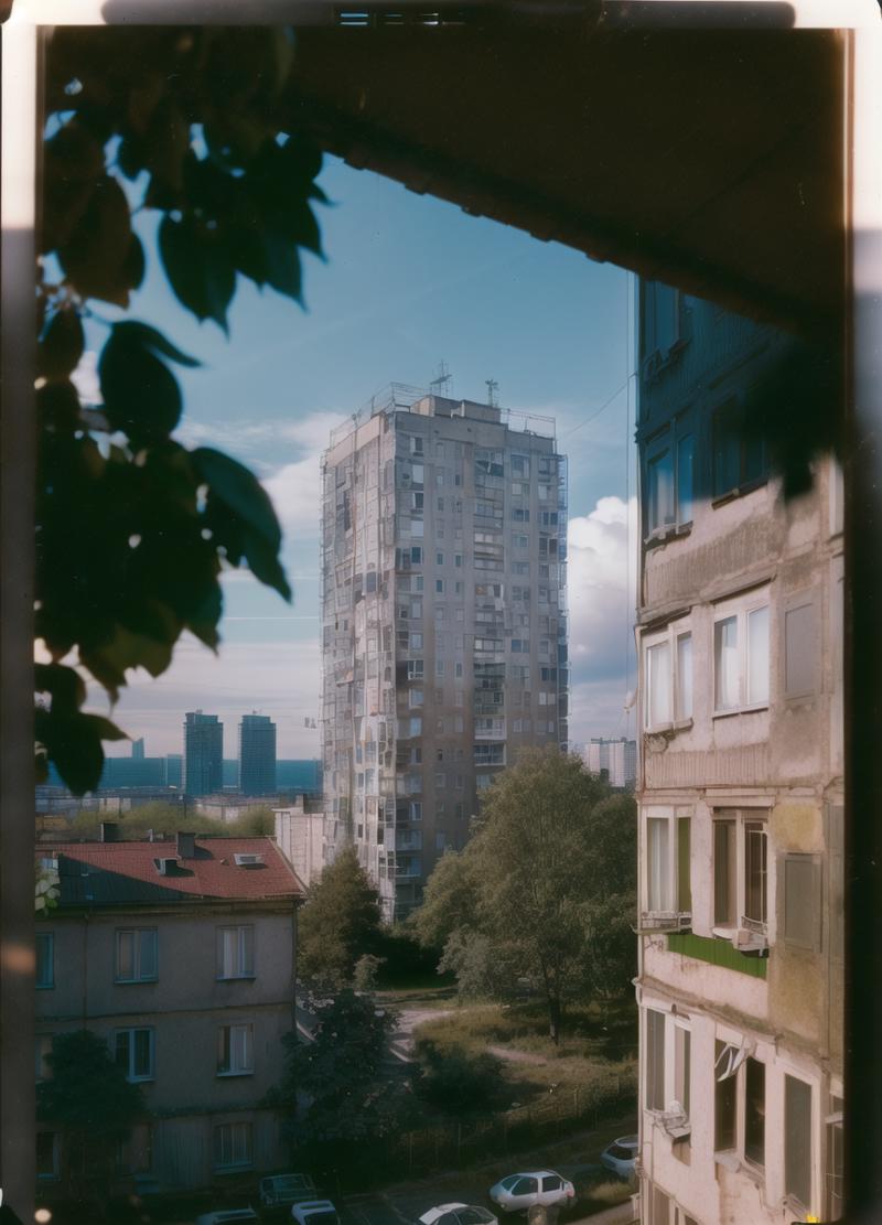 14069-4229382709-view from window, yard with large buildings, russianebenya, sunny day, trees and bushes, movie still, 80mm lens, polaroid, analo.png